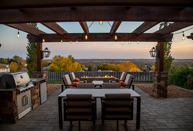 backyard pergola with firepit patio