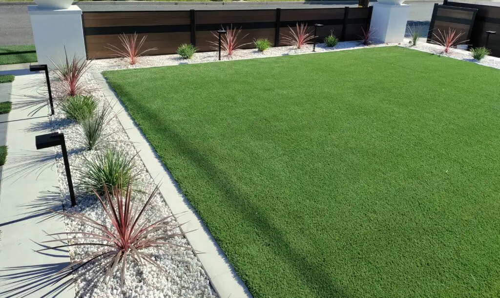 Modern artificial turf with hardscaping