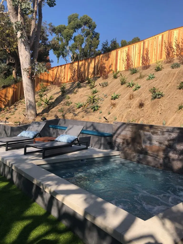 Modern backyard spa and hardscape